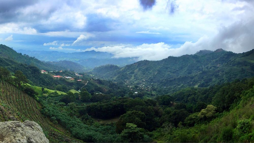 Clouds drifting over the green ridges of Costa Rica's Central Valley